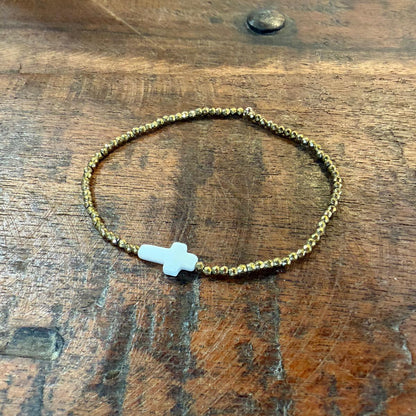 Bracelet doré croix