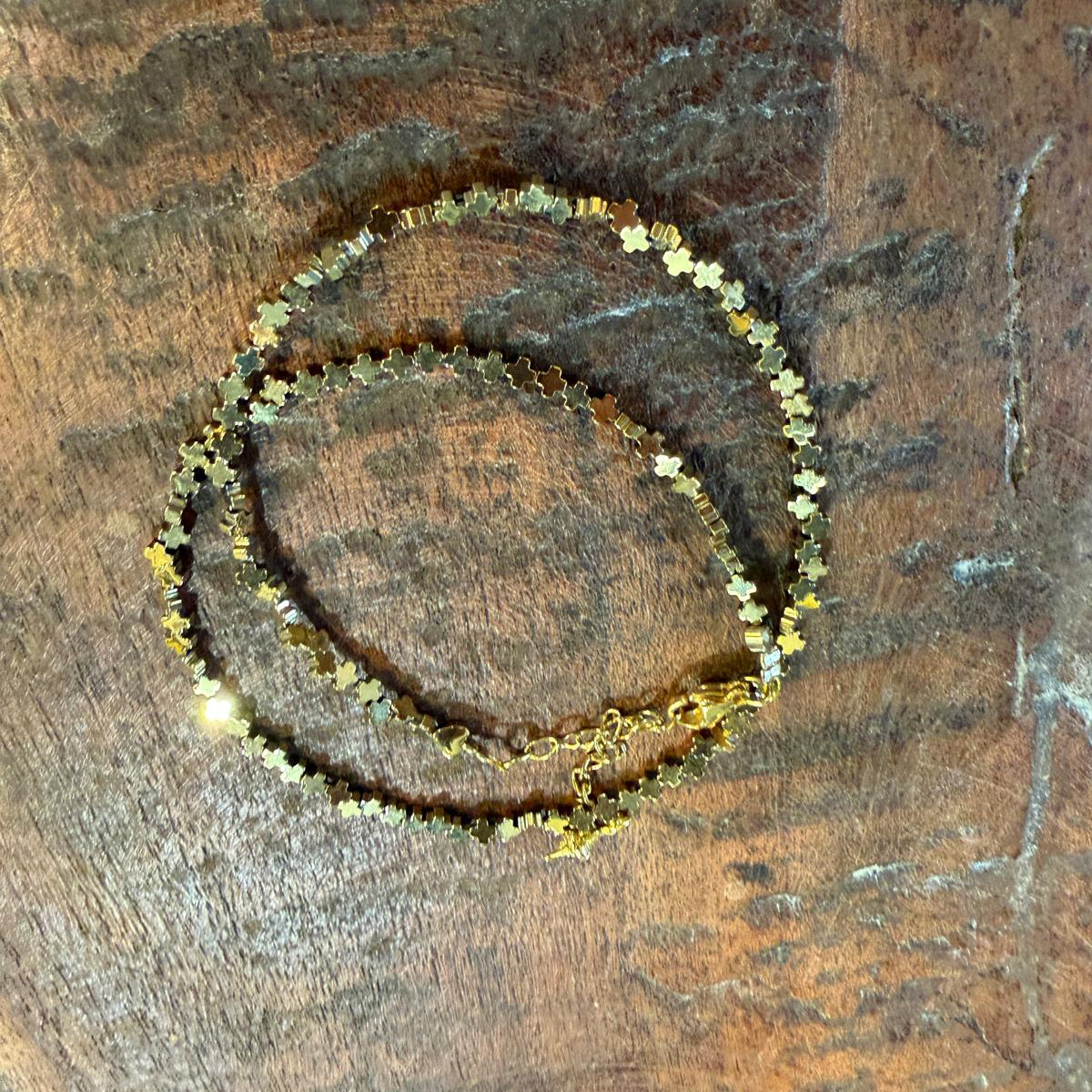 Bracelet double chaîne croix doré