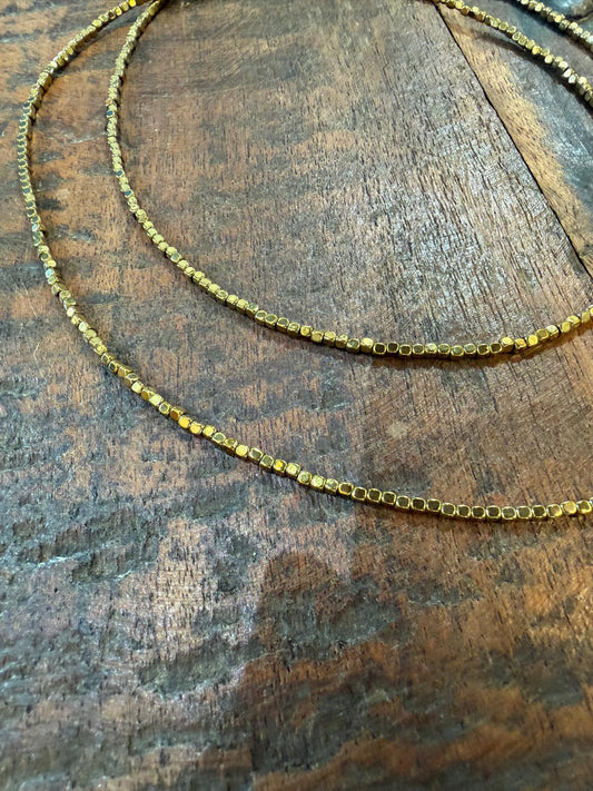 Sautoir hématites fines perles