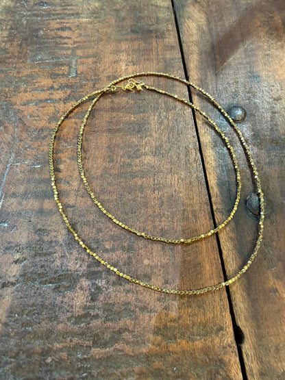 Sautoir hématites fines perles